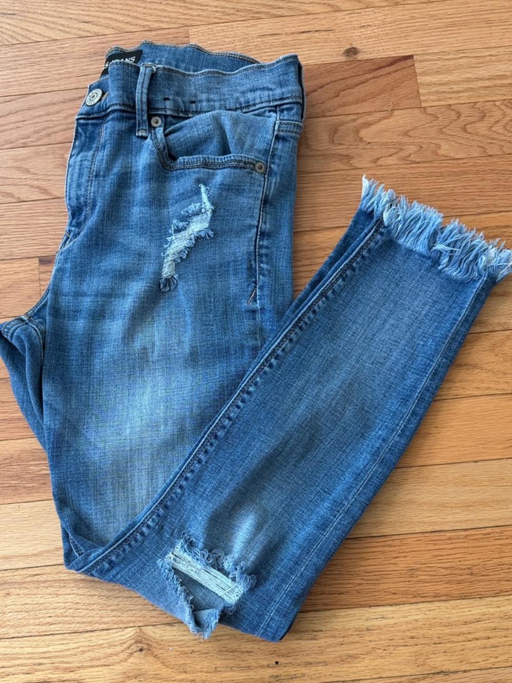 Express Women's Blue Distressed Skinny Jeans with Frayed Hem